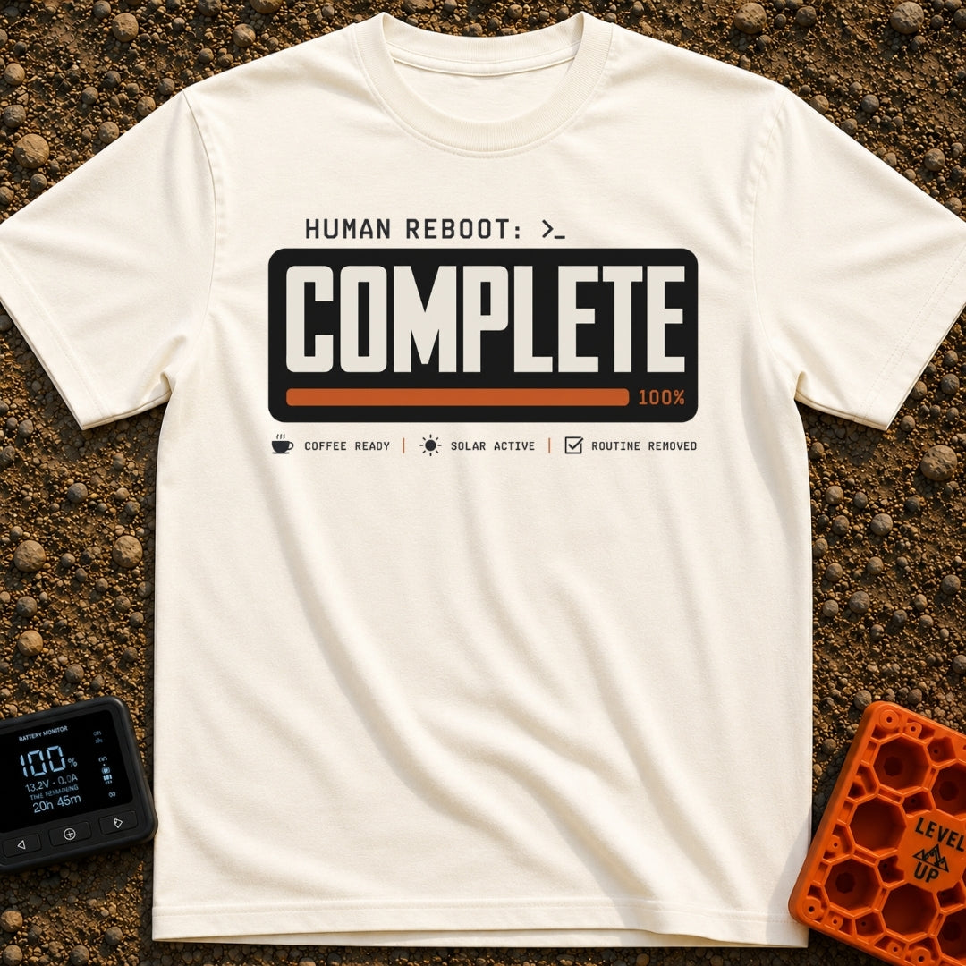 Human Reboot Complete - T-Shirt in Ivory - A graphic mimicking a computer terminal interface with the text "HUMAN REBOOT:...