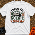 I Brake For Overlooks - T-Shirt in White - A Class C motorhome drives along a winding paved road next to a brown 'Scenic...