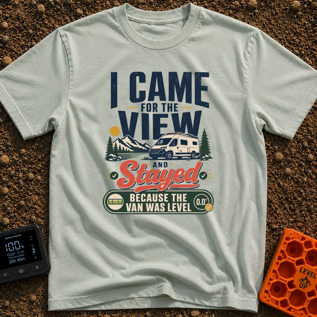 Stayed For The Level - T-Shirt in Bay - A typographic design featuring a white camper van parked near a lake with...