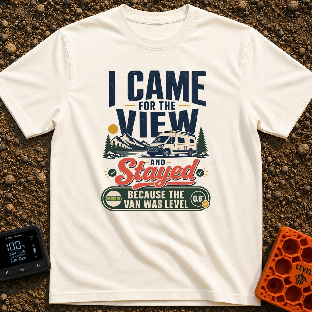 Stayed For The Level - T-Shirt in Ivory - A typographic design featuring a white camper van parked near a lake with...