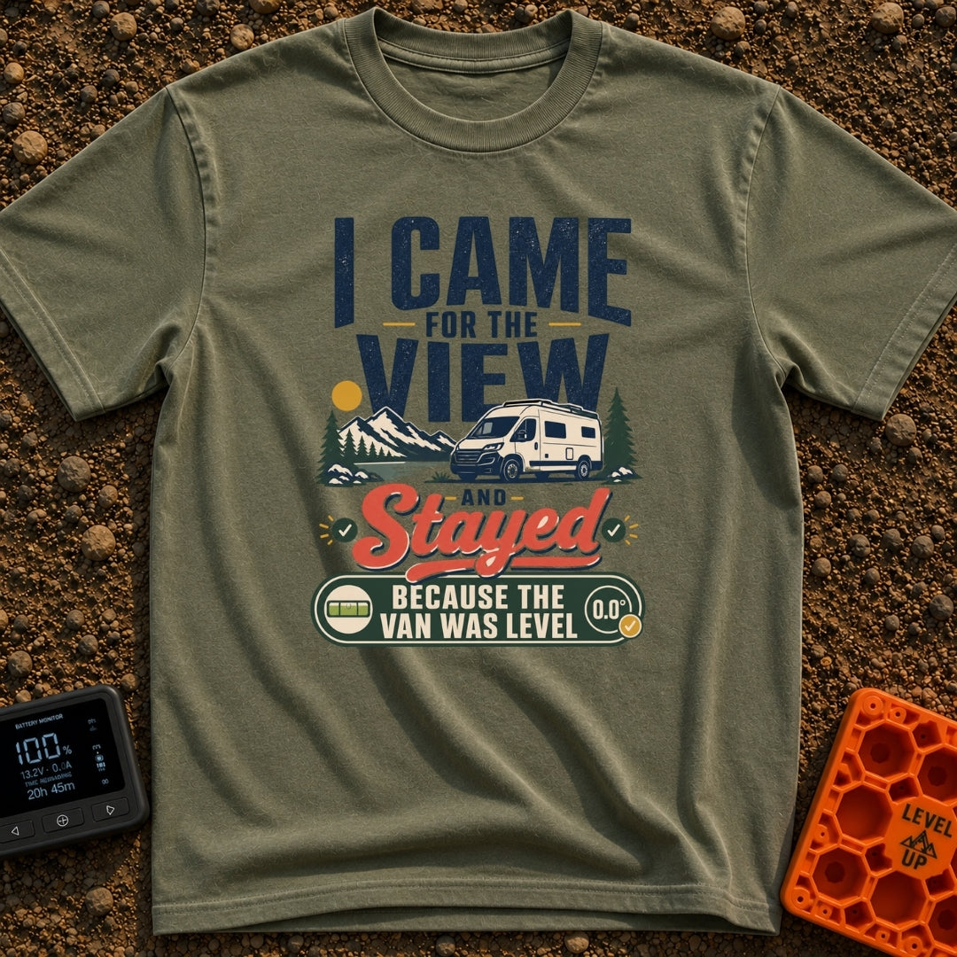 Stayed For The Level - T-Shirt in Moss - A typographic design featuring a white camper van parked near a lake with...