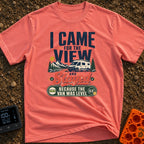 Stayed For The Level - T-Shirt in Watermelon - A typographic design featuring a white camper van parked near a lake with...