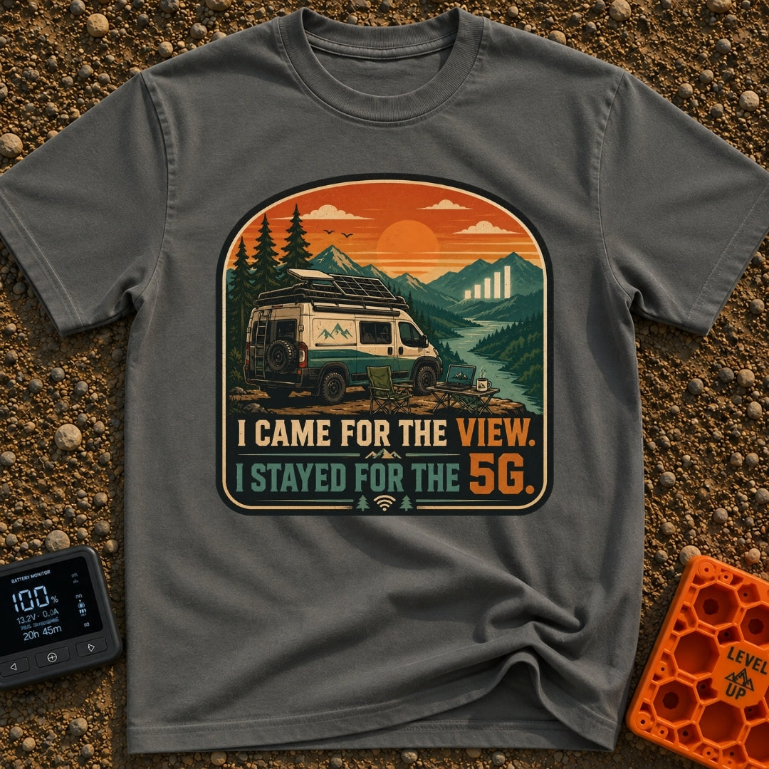 Views and 5G - T-Shirt in Pepper - A white and teal camper van parked by a river with mountains at sunset, featuring a...