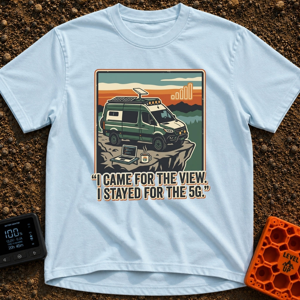 Stayed For The 5G - T-Shirt in Chambray - A green camper van with roof-mounted solar panels and a satellite dish is...