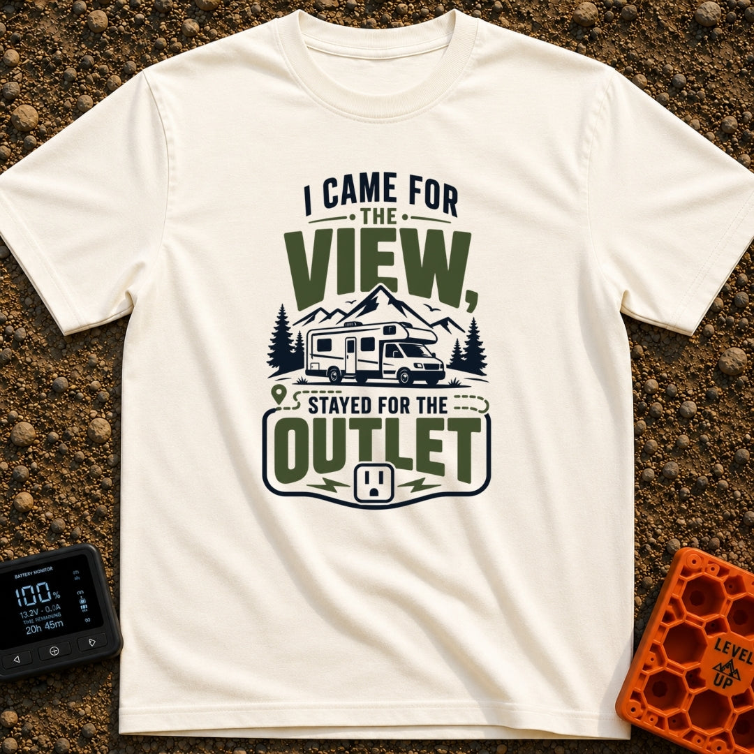 Stayed For The Outlet - T-Shirt in Ivory - A graphic featuring a Class C motorhome parked in front of mountains and pine...