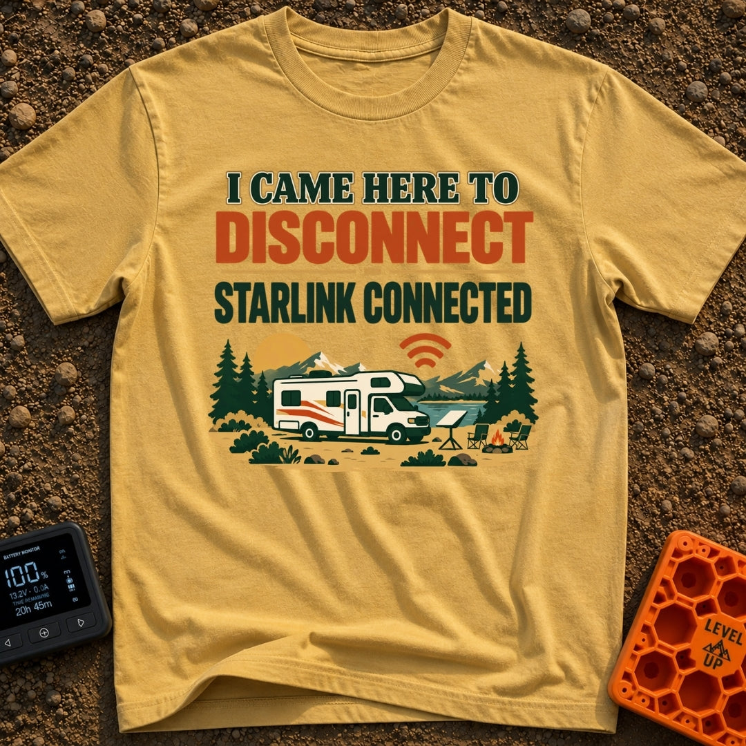 Disconnect My Starlink - T-Shirt in Mustard - A Class C motorhome parked near a lake and mountains, featuring a campsite...