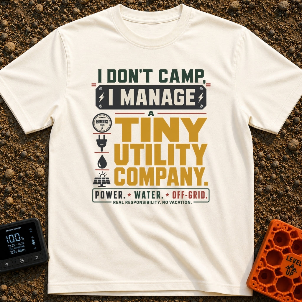 Tiny Utility Manager - T-Shirt in Ivory - A typographic design featuring the text "I DON'T CAMP, I MANAGE A TINY UTILITY...