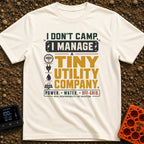 Tiny Utility Manager - T-Shirt in Ivory - A typographic design featuring the text "I DON'T CAMP, I MANAGE A TINY UTILITY...