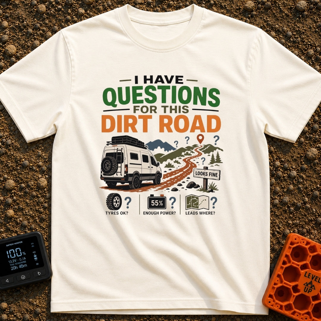 Questions For The Road - T-Shirt in Ivory - A white camper van is parked next to a winding dirt road leading into...