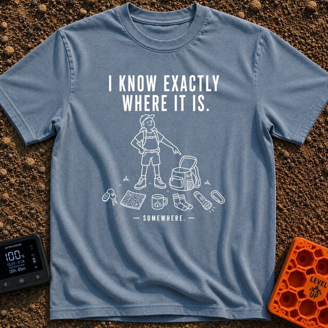 I Know It's Here - T-Shirt in Blue Jean - A white line drawing of a person in a cap and shorts pointing at an open...