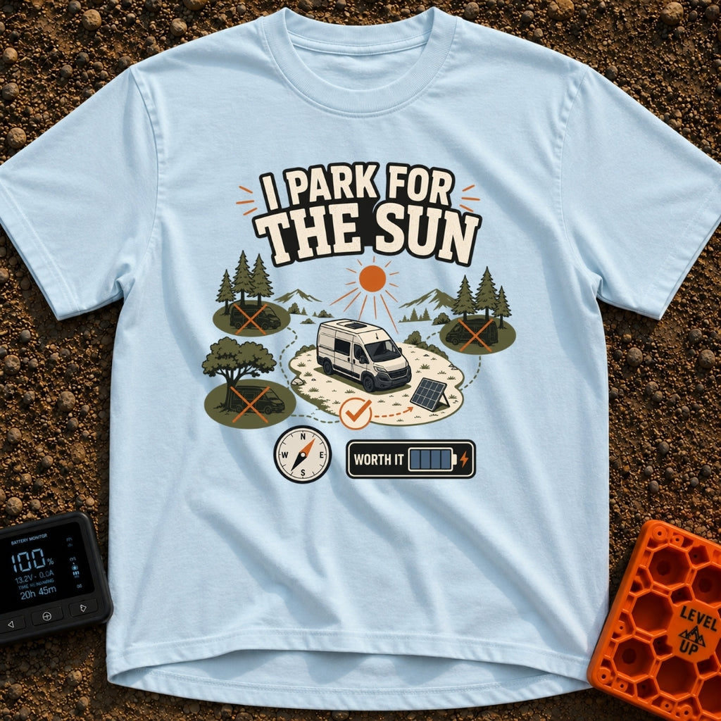 Chase The Sun - T-Shirt in Chambray - A white camper van parked in a sunny clearing with a portable solar panel set up,...