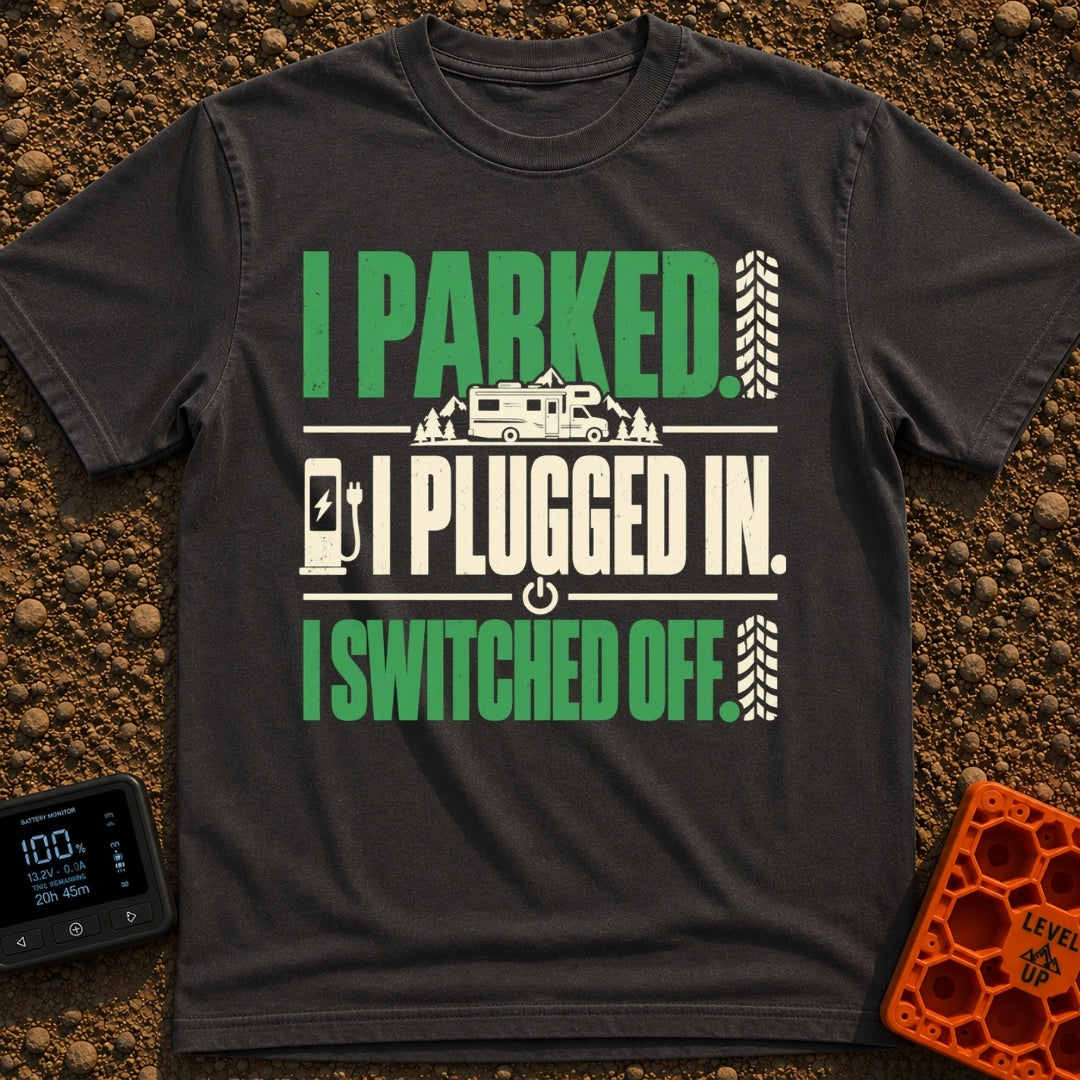 Plugged In Switched Off - T-Shirt in Graphite - A typographic design featuring the text "I PARKED.", "I PLUGGED IN.", and...