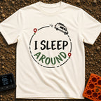 I Sleep Around - T-Shirt in Ivory - A white camper van driving along a circular dashed line with two map location pins,...