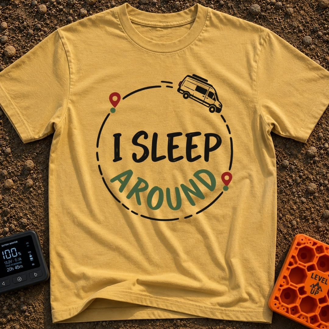 I Sleep Around - T-Shirt in Mustard - A white camper van driving along a circular dashed line with two map location pins,...