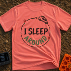 I Sleep Around - T-Shirt in Watermelon - A white camper van driving along a circular dashed line with two map location...