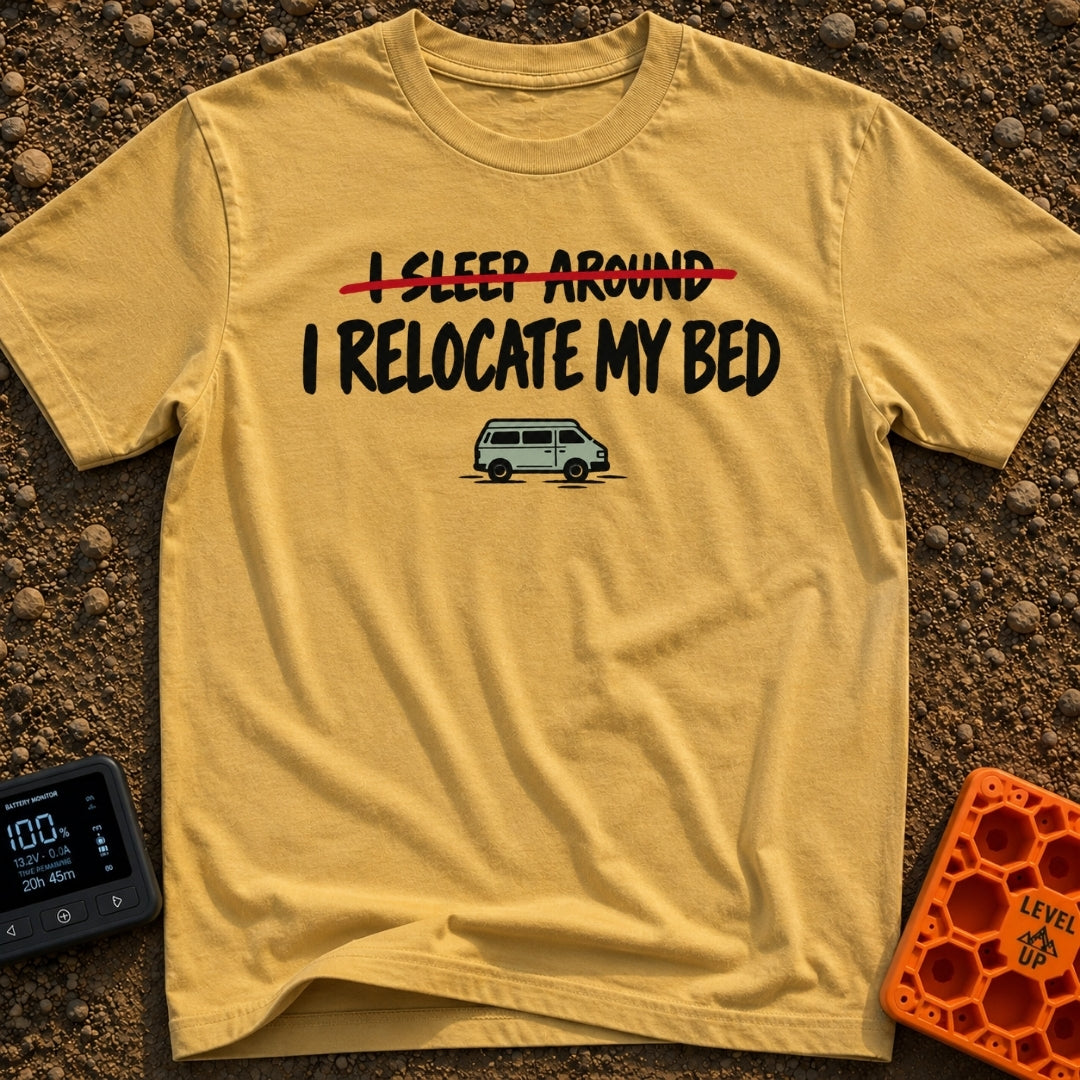 I Sleep Around - T-Shirt in Mustard - The design features the text "I SLEEP AROUND" crossed out by a red line, followed...