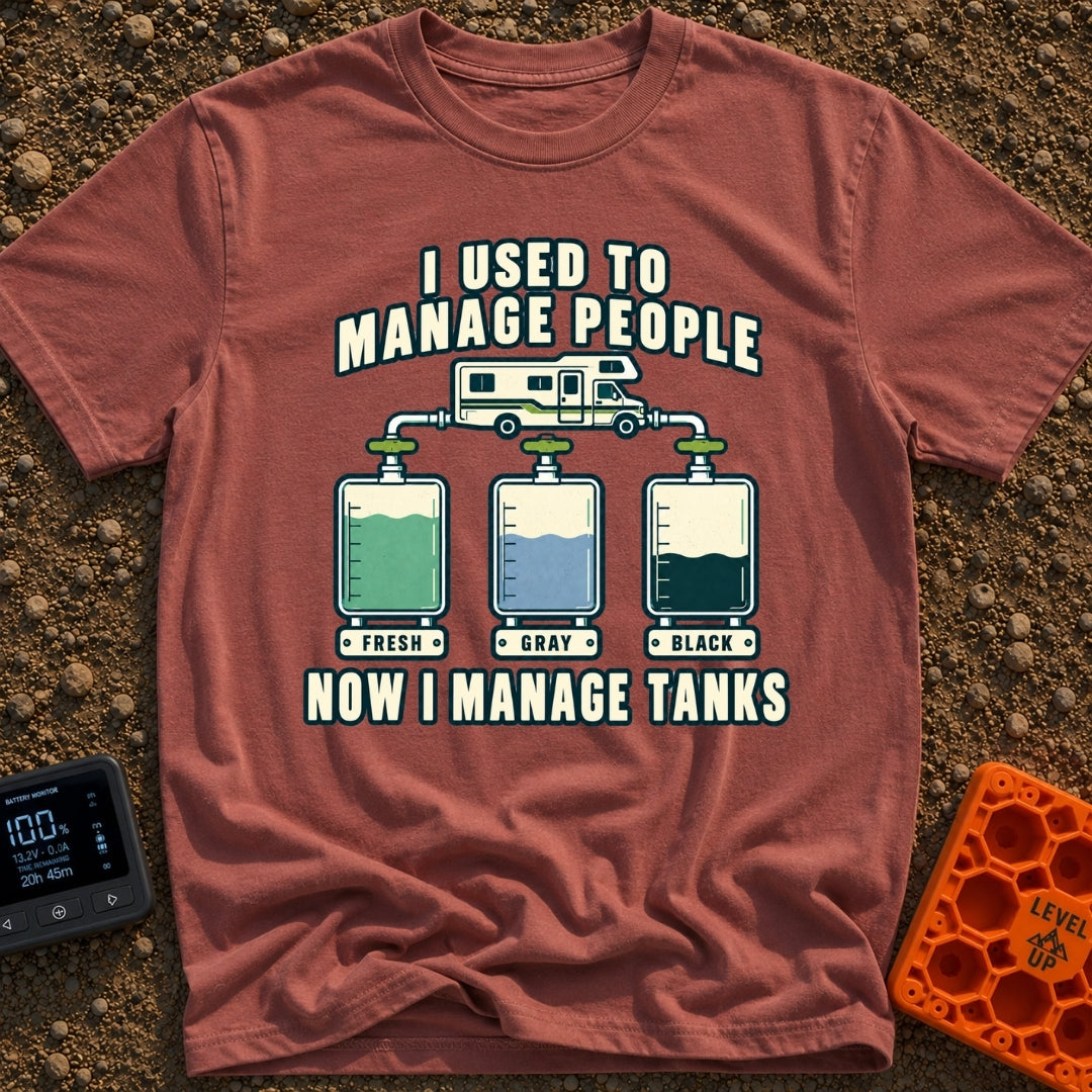 I Managed To Escape - T-Shirt in Brick - An illustration of a Class C motorhome connected by pipes to three...