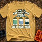 I Managed To Escape - T-Shirt in Mustard - An illustration of a Class C motorhome connected by pipes to three...