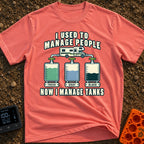 I Managed To Escape - T-Shirt in Watermelon - An illustration of a Class C motorhome connected by pipes to three...