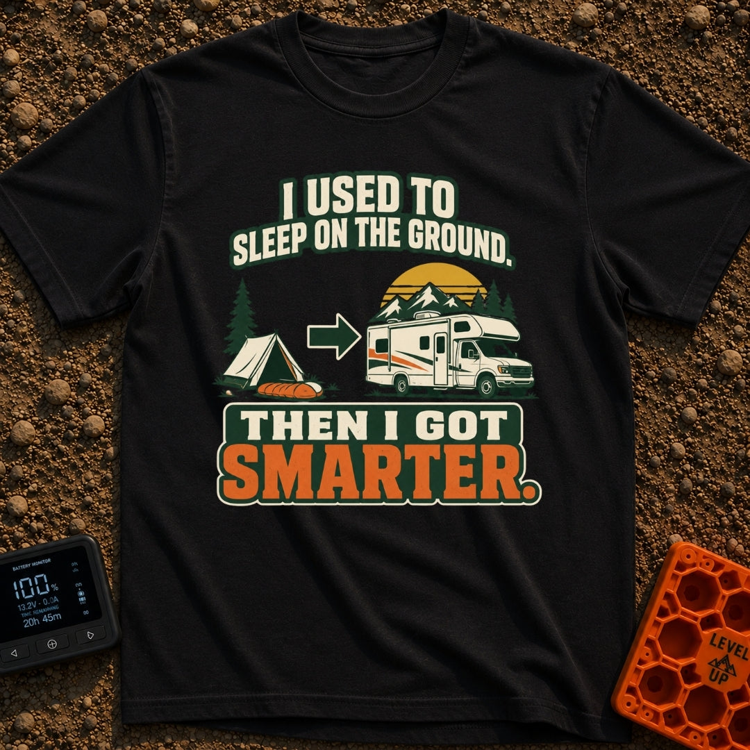 Retired From The Ground - T-Shirt in Black - A graphic illustrating an evolution, showing a traditional A-frame tent and...