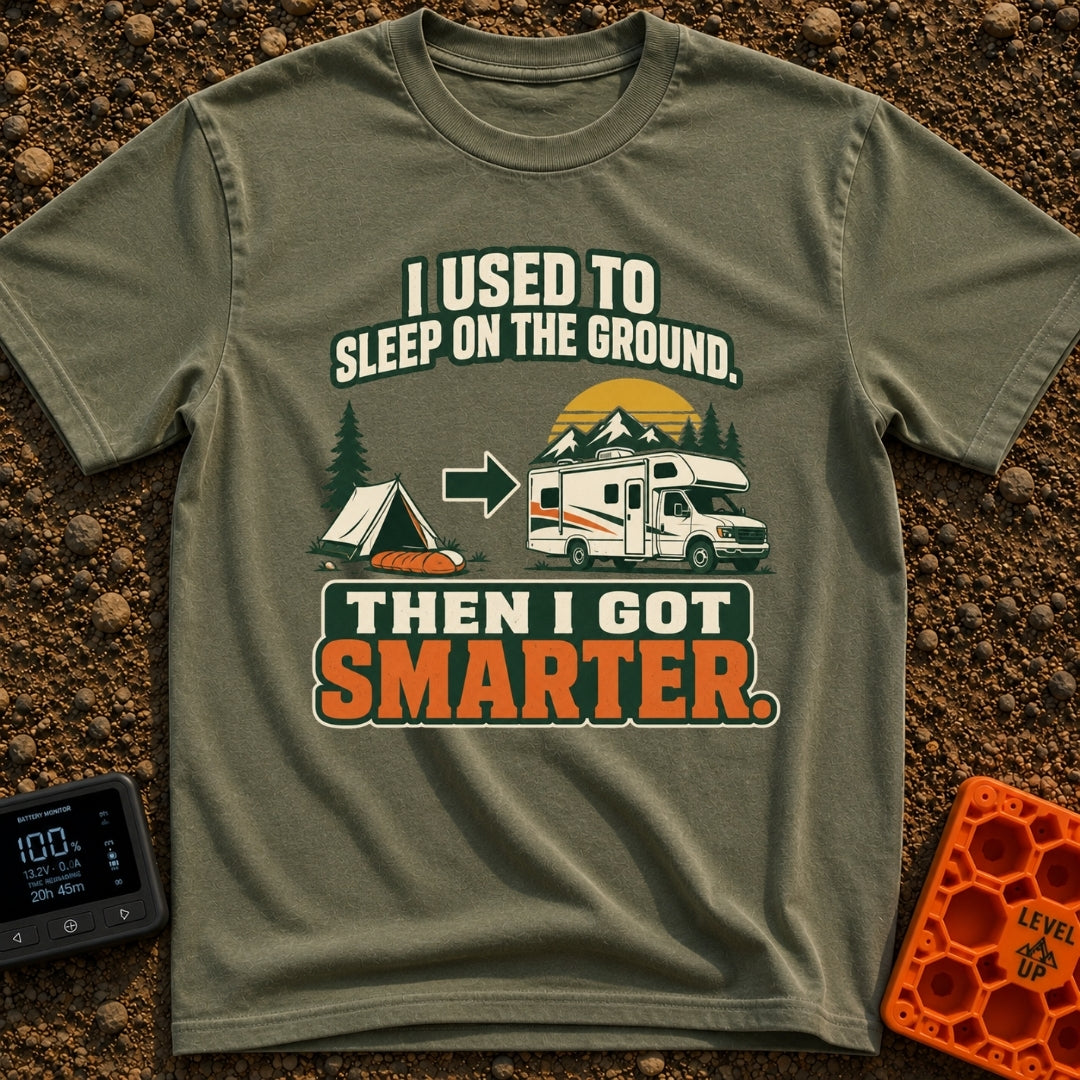 Retired From The Ground - T-Shirt in Moss - A graphic illustrating an evolution, showing a traditional A-frame tent and...