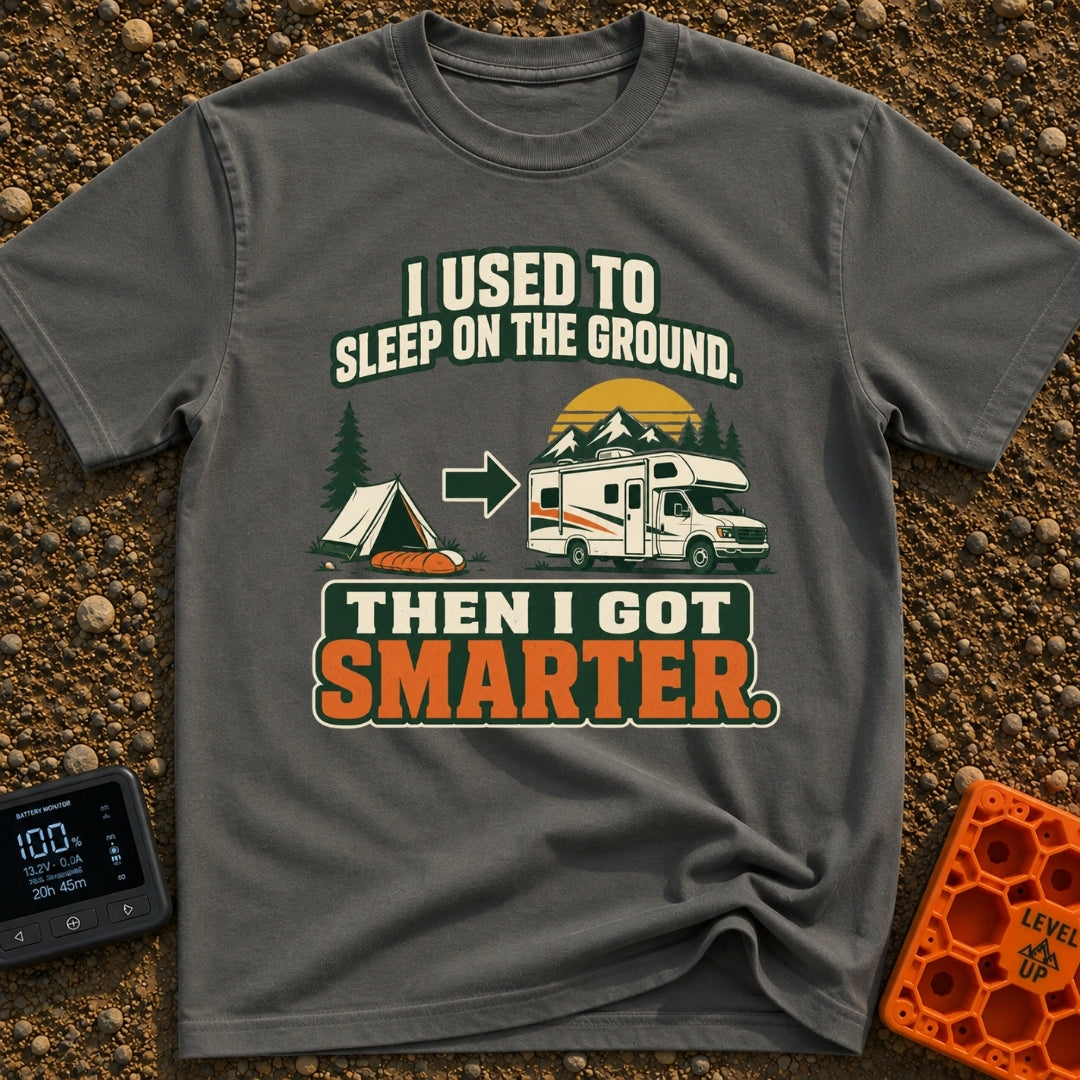 Retired From The Ground - T-Shirt in Pepper - A graphic illustrating an evolution, showing a traditional A-frame tent and...