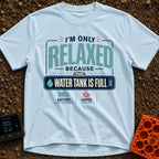 Only Relaxed When Full - T-Shirt in Chambray - A typographic design reading "I'm Only Relaxed Because The Water Tank Is...