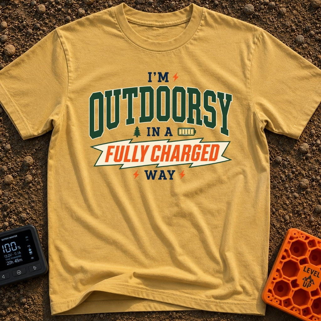 Outdoorsy And Fully Charged - T-Shirt in Mustard - A text-based design reading "I'M OUTDOORSY IN A FULLY CHARGED WAY",...