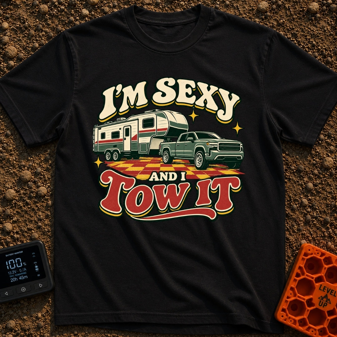 Sexy And I Tow - T-Shirt in Black - A retro-style illustration of a green pickup truck towing a large fifth-wheel camper...
