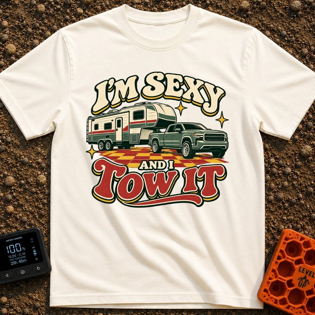Sexy And I Tow - T-Shirt in Ivory - A retro-style illustration of a green pickup truck towing a large fifth-wheel camper...