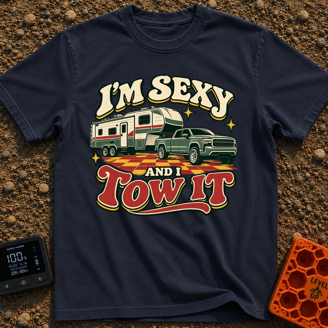Sexy And I Tow - T-Shirt in Navy - A retro-style illustration of a green pickup truck towing a large fifth-wheel camper...