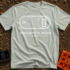 Vanishing Act Mode - T-Shirt in Bay - A black and white graphic showing a digital toggle switch flipped to the ON...