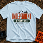 Independent By Nature - T-Shirt in Chambray - A graphic design featuring mountain peaks, pine trees, and topographical...