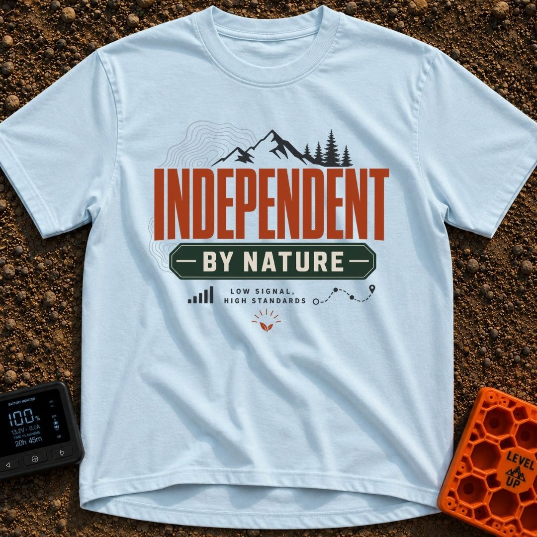 Independent By Nature - T-Shirt in Chambray - A graphic design featuring mountain peaks, pine trees, and topographical...