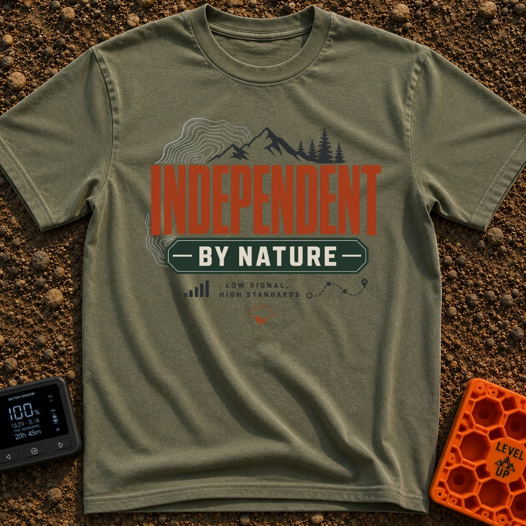 Independent By Nature - T-Shirt in Moss - A graphic design featuring mountain peaks, pine trees, and topographical map...