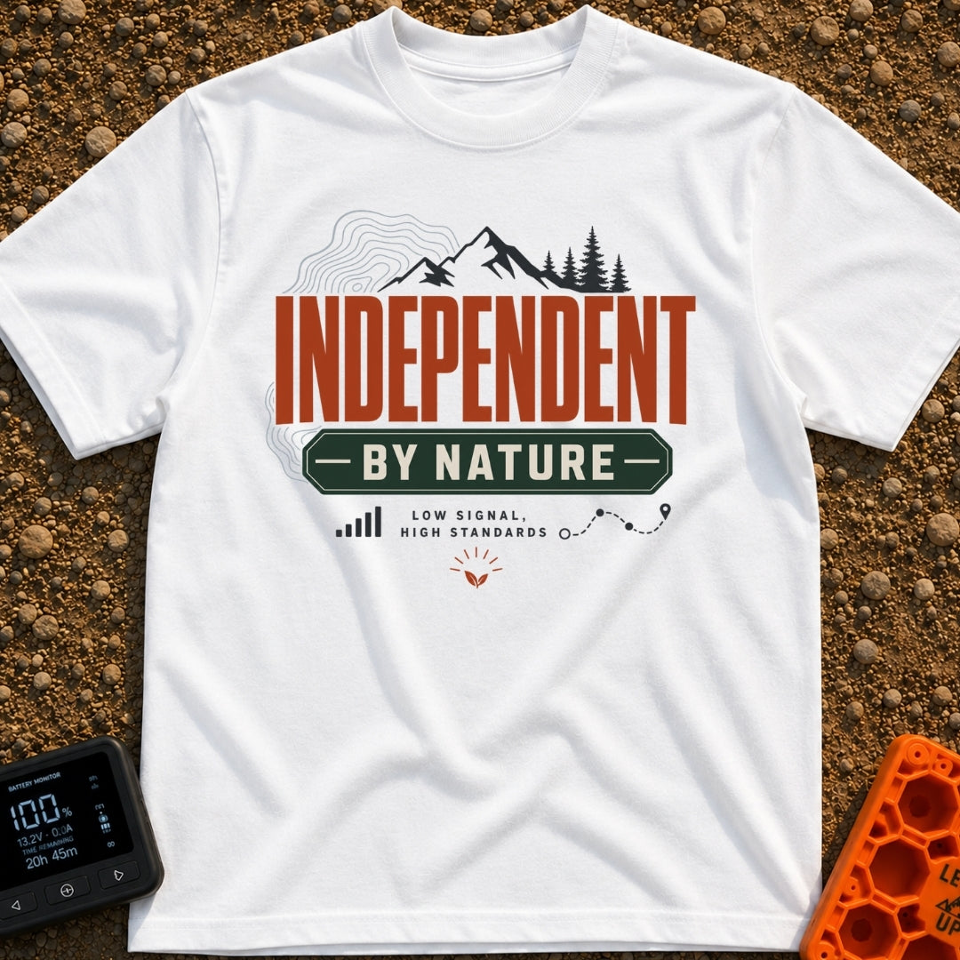 Independent By Nature - T-Shirt in White - A graphic design featuring mountain peaks, pine trees, and topographical map...
