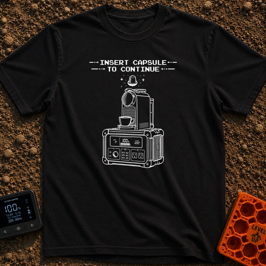 Insert Pod To Continue - T-Shirt in Black - A black and white illustration of a pod-style coffee maker sitting on top of...