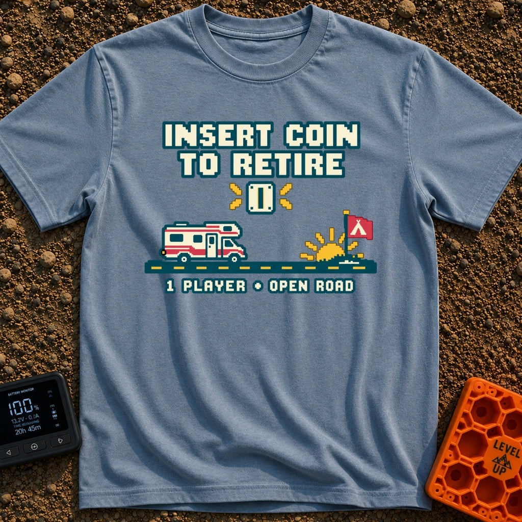 Insert Coin To Retire - T-Shirt in Blue Jean - A retro 8-bit pixel art design showing a Class C RV driving on a dashed...