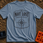 Elsewhere On Purpose - T-Shirt in Blue Jean - A black and white distressed graphic featuring an ornate border, with bold...