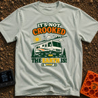 The Earth Is Crooked - T-Shirt in Bay - An illustration of a large motorhome parked in nature with its front tire resting...