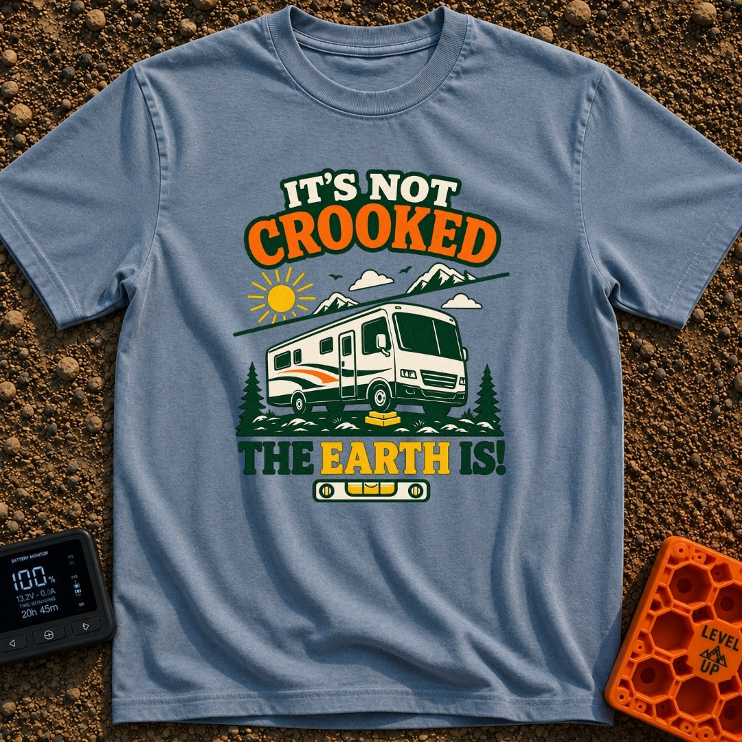 The Earth Is Crooked - T-Shirt in Blue Jean - An illustration of a large motorhome parked in nature with its front tire...