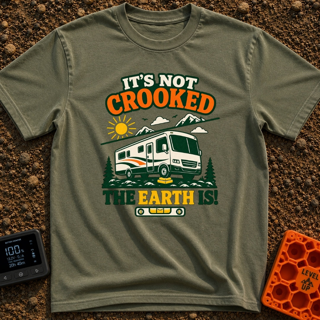The Earth Is Crooked - T-Shirt in Moss - An illustration of a large motorhome parked in nature with its front tire...