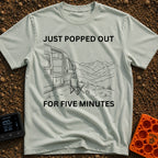 Out For Five Minutes - T-Shirt in Bay - A black and white line drawing of a camper van with its side door open, parked...