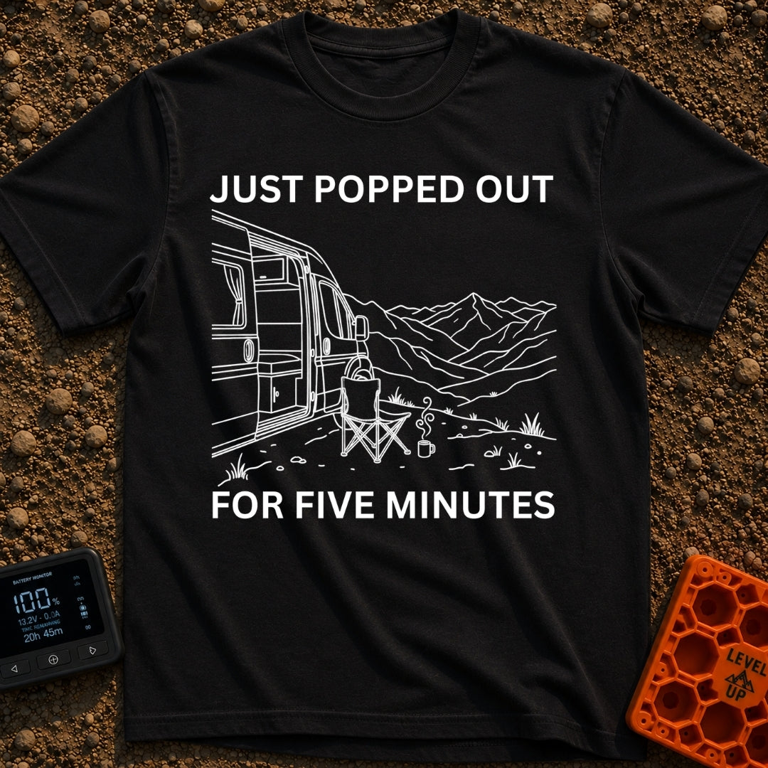 Out For Five Minutes - T-Shirt in Black - A black and white line drawing of a camper van with its side door open, parked...