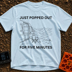 Out For Five Minutes - T-Shirt in Chambray - A black and white line drawing of a camper van with its side door open,...