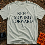 Keep Moving Forward - T-Shirt in Bay - The design features the phrase "KEEP MOVING FORWARD" in a large, stacked serif...