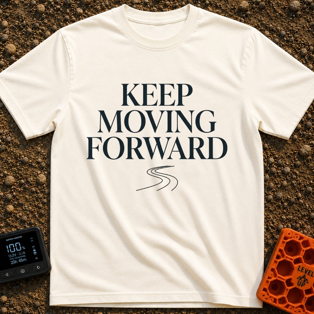 Keep Moving Forward - T-Shirt in Ivory - The design features the phrase "KEEP MOVING FORWARD" in a large, stacked serif...