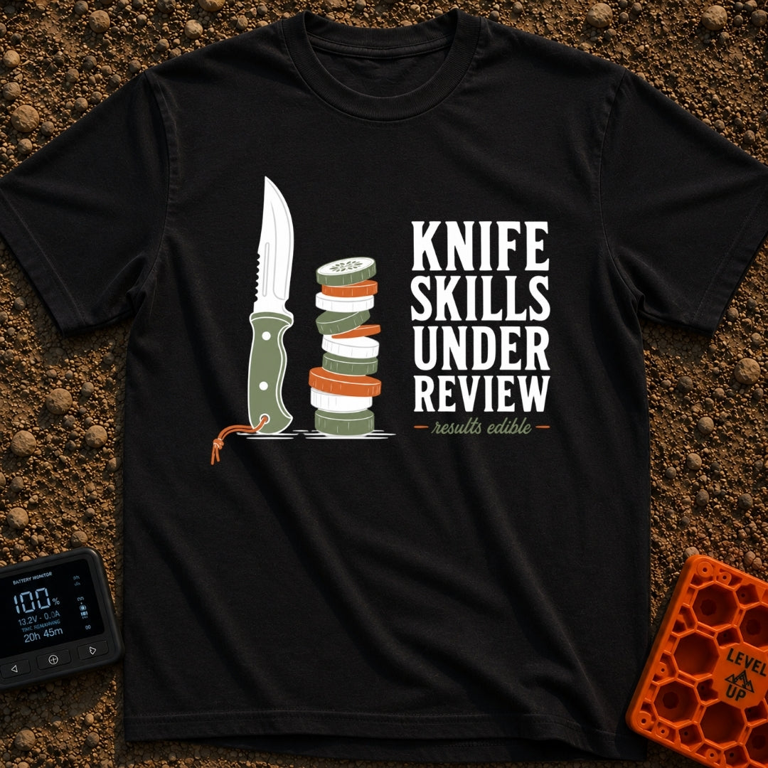 Chop Till You Drop - T-Shirt in Black - An illustration of a green-handled outdoor knife with an orange lanyard standing...