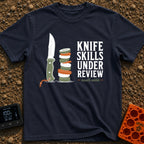 Chop Till You Drop - T-Shirt in Navy - An illustration of a green-handled outdoor knife with an orange lanyard standing...
