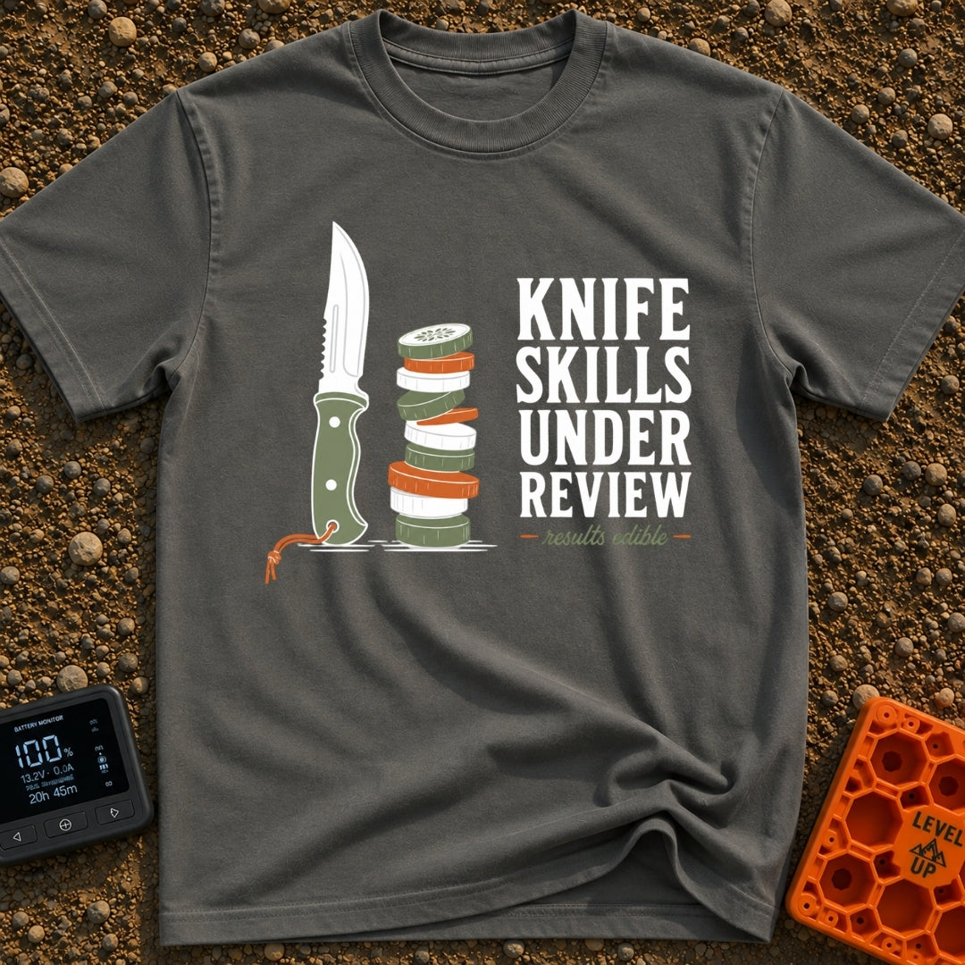 Chop Till You Drop - T-Shirt in Pepper - An illustration of a green-handled outdoor knife with an orange lanyard standing...